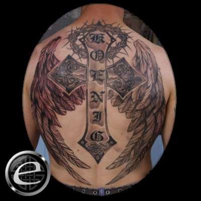Winged cross on back tattoo