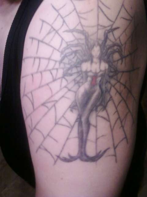 black widow woman tattoo