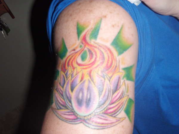 lotus tattoo with flames & rays tattoo