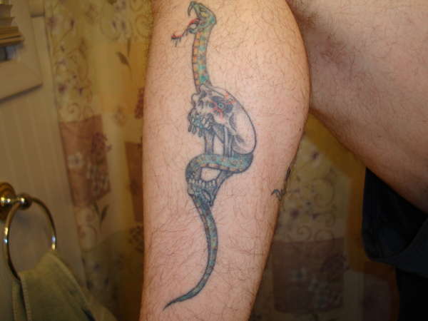 skull/snake tattoo