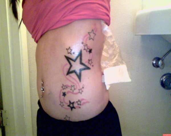 stars down my side tattoo
