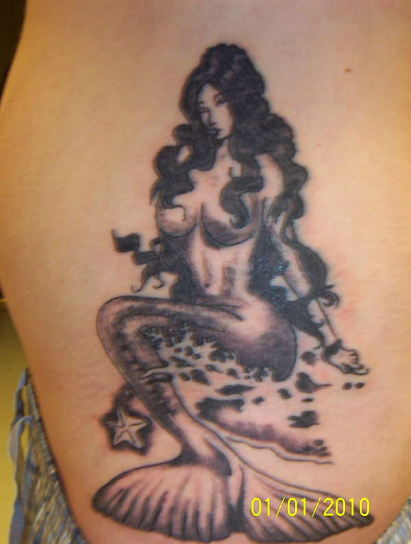 the first black and grey tatt I did tattoo