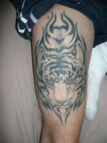 tiger on thigh tattoo