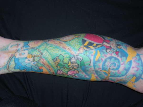 Alice in Wonderland right side tattoo
