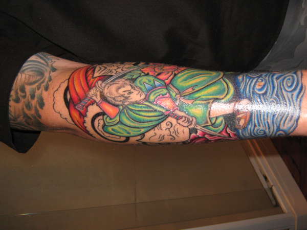 Arm sleeve in construction tattoo