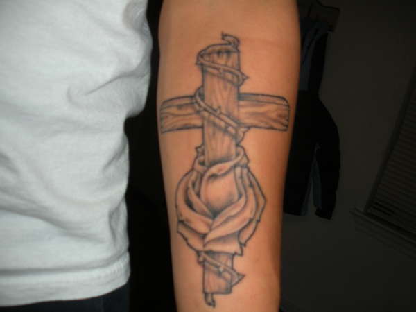 Cross with a rose tattoo