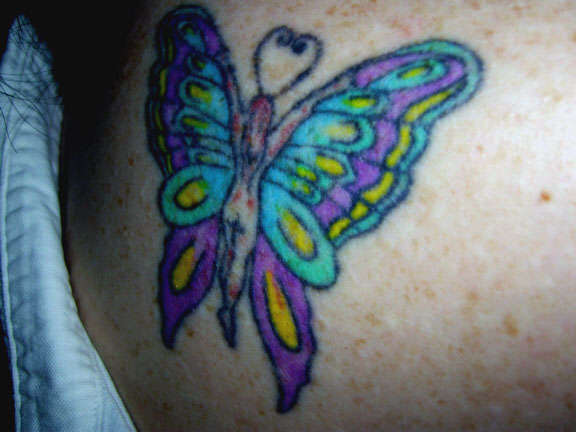 Fairy/butterfly tattoo