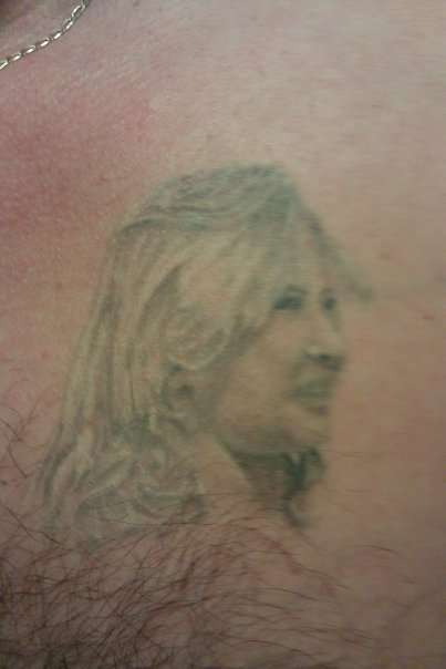 First one June 06 Daughter at 7yrs. tattoo