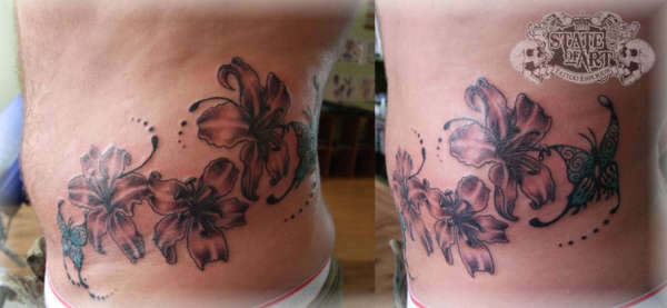 Hibiscus on hip tattoo