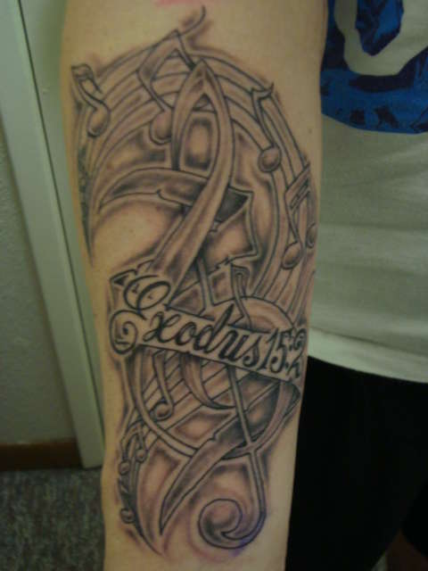 Music piece tattoo