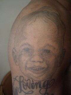 Portrait of my son tattoo