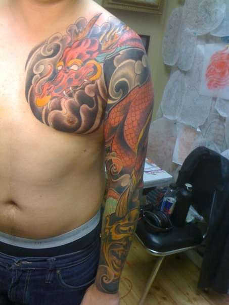 Red Dragon full sleeve tattoo