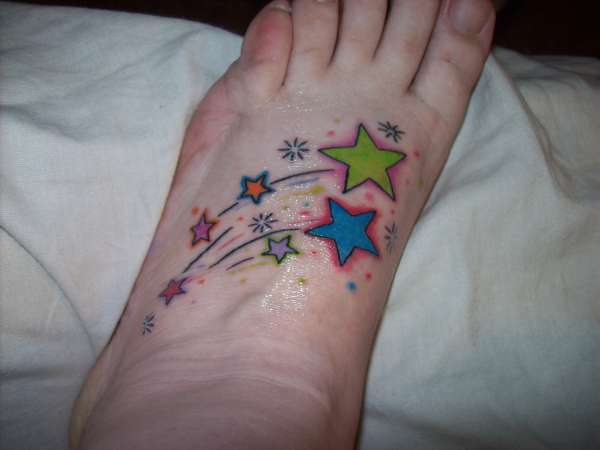 Shooting stars on my foot tattoo