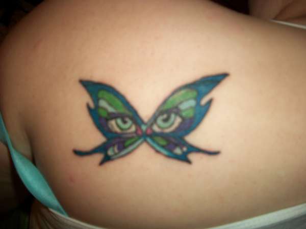 butterfly with eyes tattoo