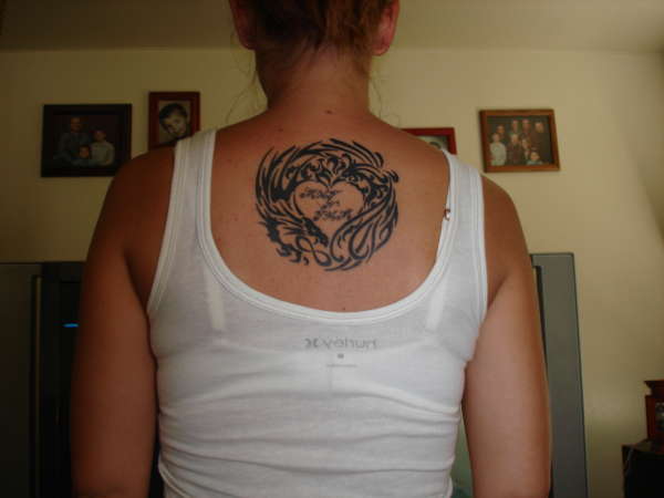 dragon/phoenix anniversary tat tattoo