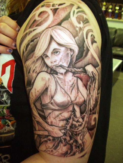 Girl eating her own insides tattoo