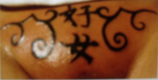 symbols i did for a friend tattoo