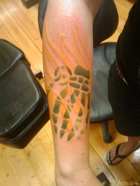 Grenade/Flames tattoo