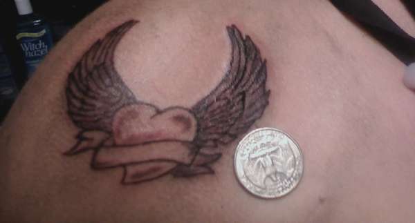 Heart with wings tattoo