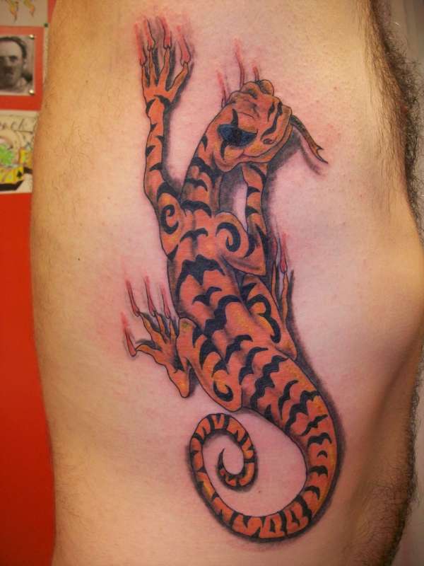 Lizard on doug's side tattoo