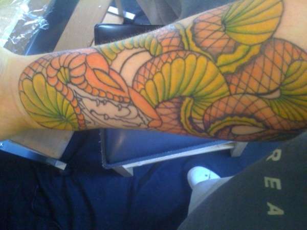 Snake-sleeve tattoo