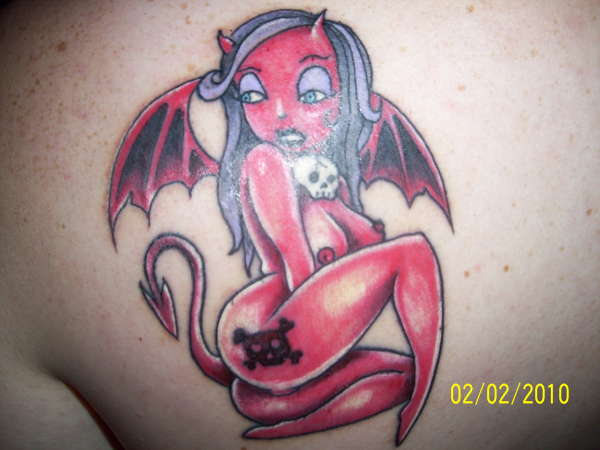 devil girl/richard tate tattoo
