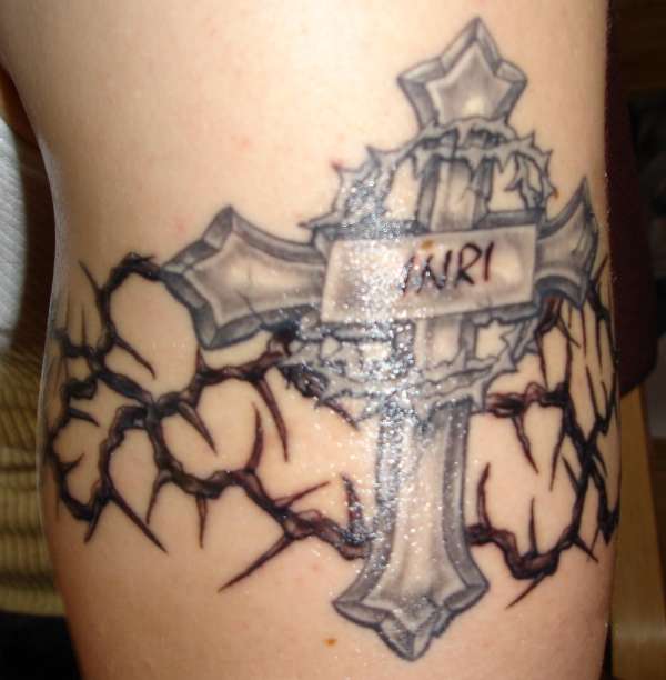 Cross and thorns tattoo