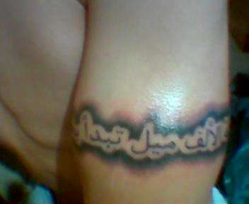 Arabic arm band tattoo