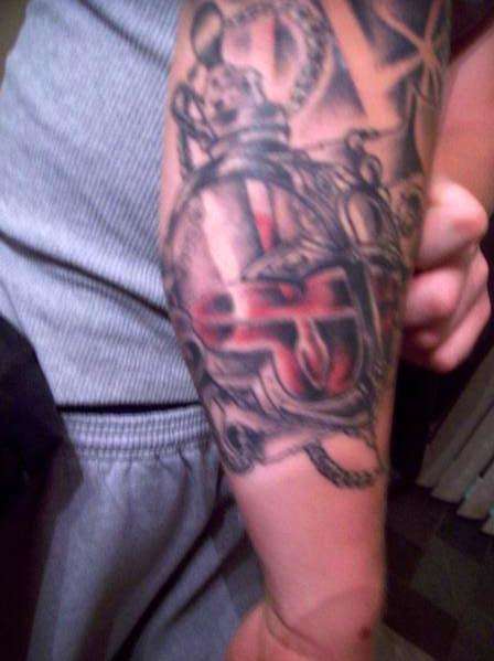 sacred heart locket tattoo