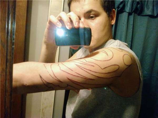same tribal tattoo