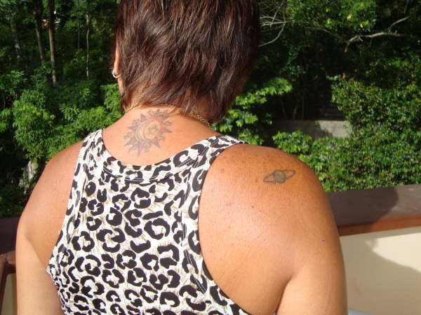 the sun and  netuno tattoo