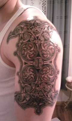 Celtic shoulder pce tattoo