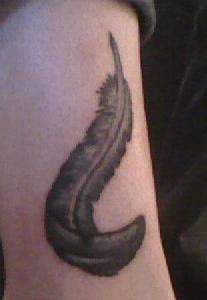 Coverup Feather tattoo