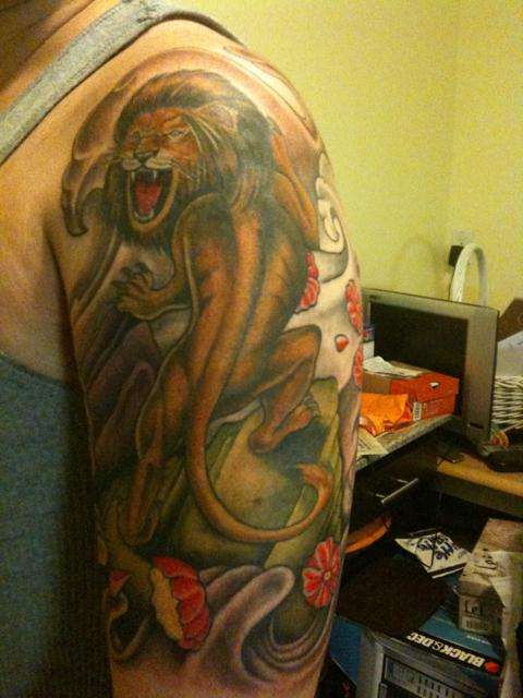 Crazy Lion tattoo