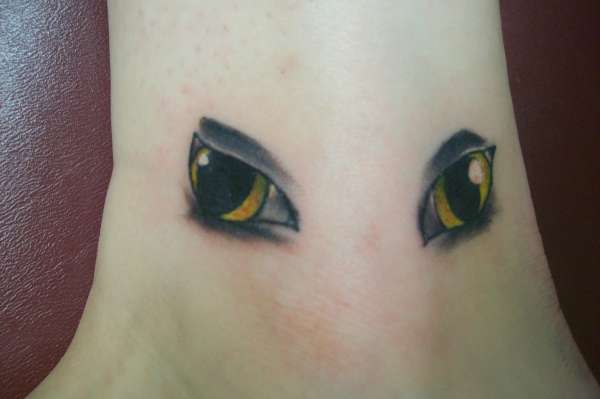 Plum's Eyes tattoo