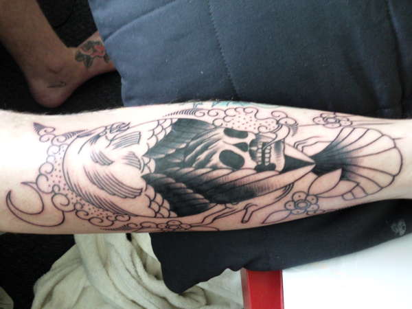 Skull and eagle tattoo