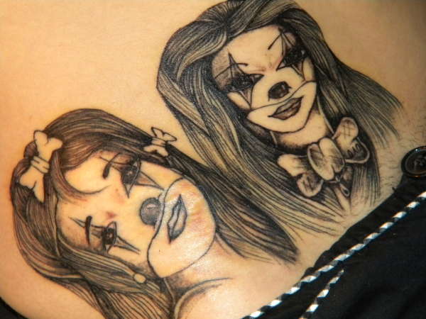 clowns on hip tattoo