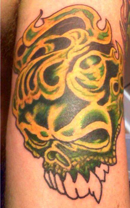 green flamin skull tattoo
