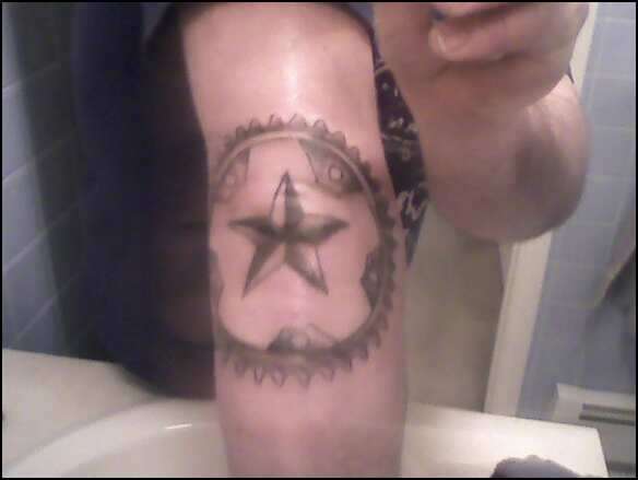 nautical star & sprocket tattoo