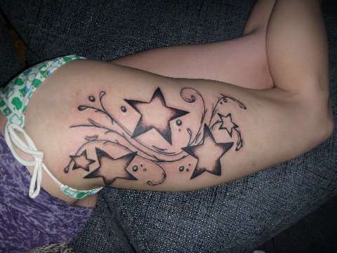 whispy stars tattoo