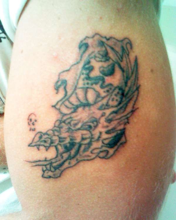 Dragon Skin Tare tattoo