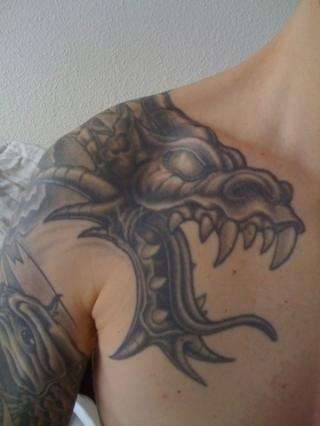 Dragon - right chest tattoo