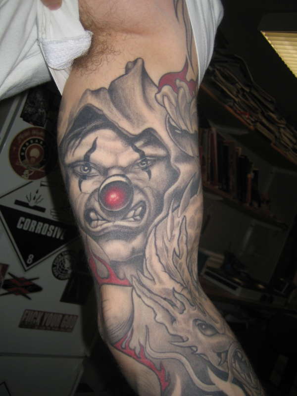 Hooded clown - left arm/colorblind.dk tattoo
