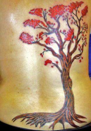Maple tree cover up tattoo