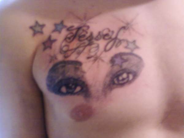 My eyes and name on my mans chest tattoo