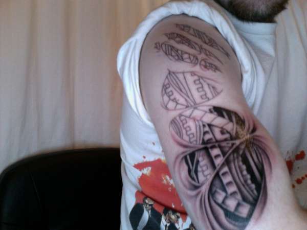 Ripped Bio-Mech Unfinished tattoo