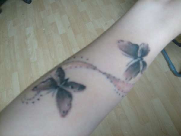 and dragon fly wrapping around my lower arm tattoo and dragon fly wrapping around my lower arm tattoo