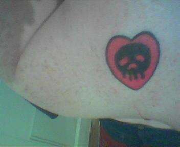 Sort of Alkaline Trio Skull In Heart tattoo