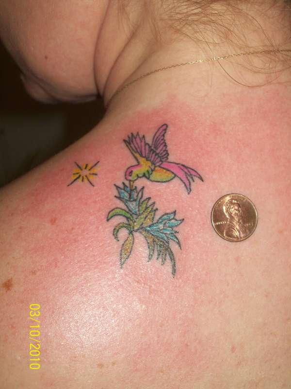little bird on shoulder tattoo
