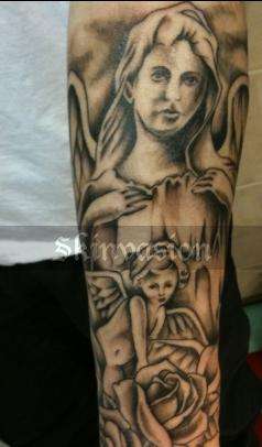 religious angel tattoo